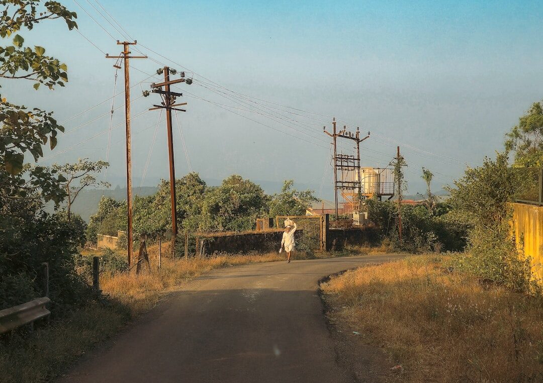 photographer with camera in rural area